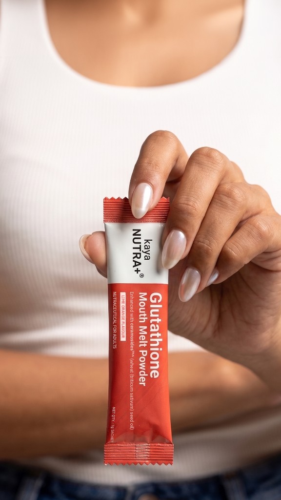 Kaya Nutra+ Glutathione mouth melt powder sachet held in hand